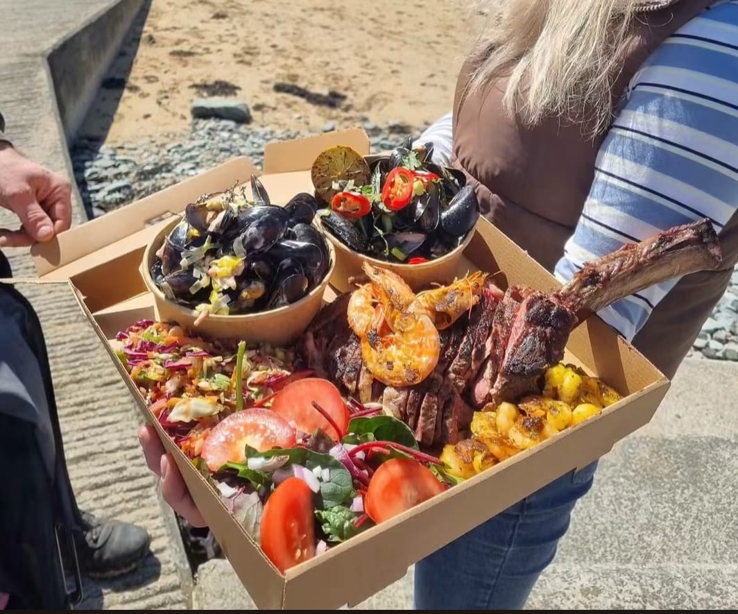 Outdoor seafood and barbecue platter